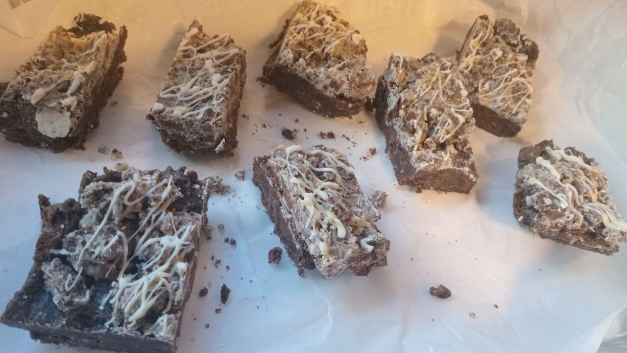 Chocolate brownie slices with white chocolate drizzle